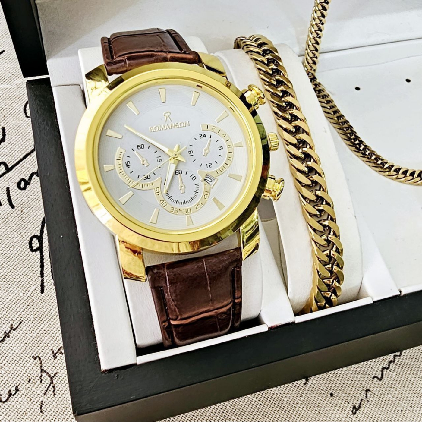 تصویر  ساعت مردانه رومانسون بند قهوه‌ای صفحه سفید قاب طلایی 369522