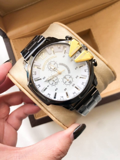 تصویر  ساعت دیزل مردانه بند استیل مشکی صفحه سفید شاخ‌دار طلایی